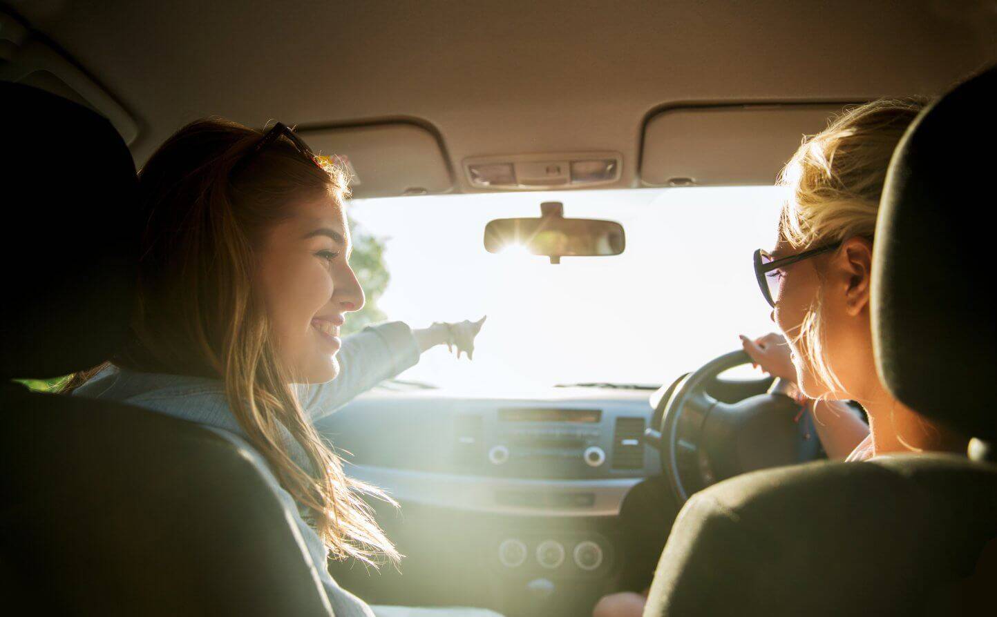 Two women on a journey in a car