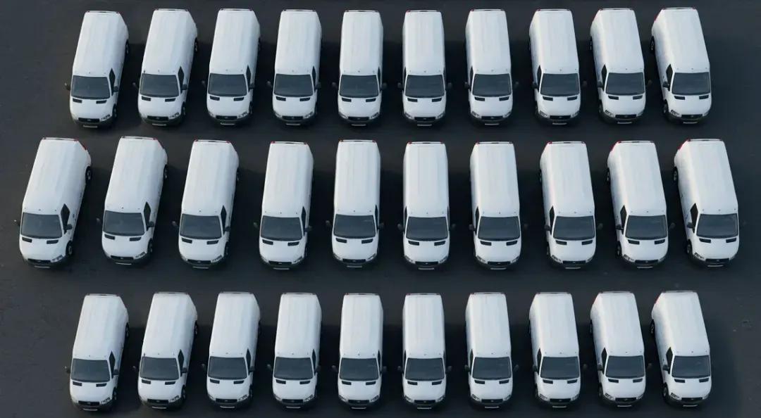 Fleet vans in a parking lot