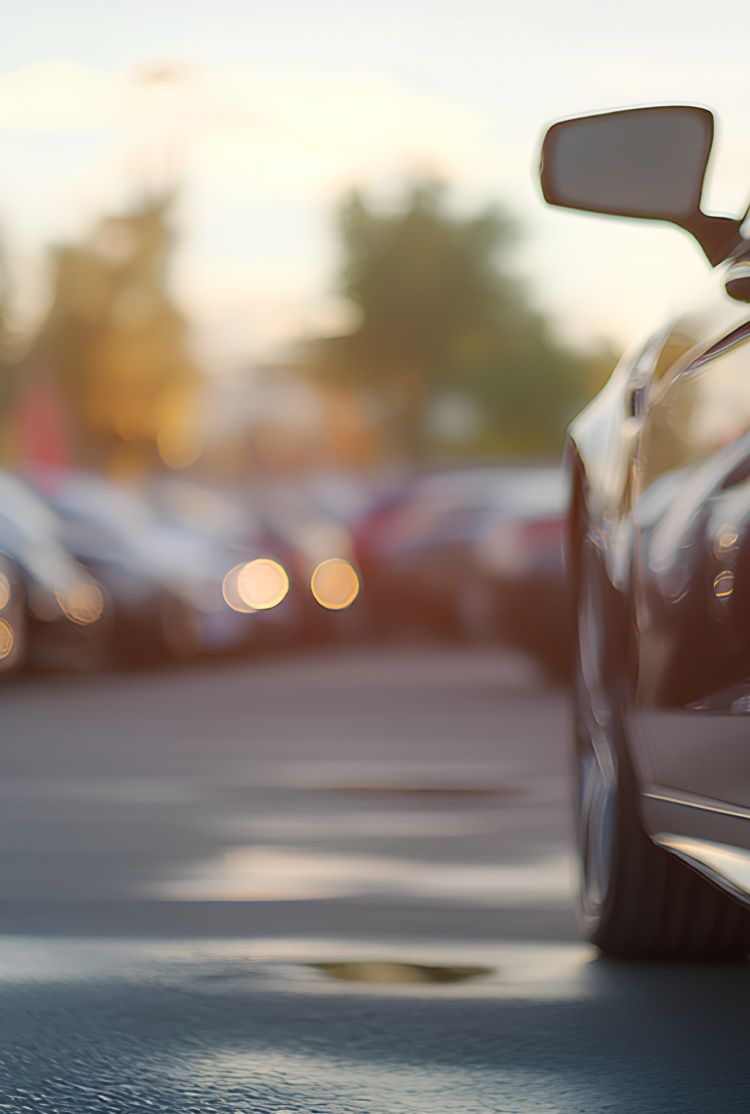 A car pulling away from a parking lot