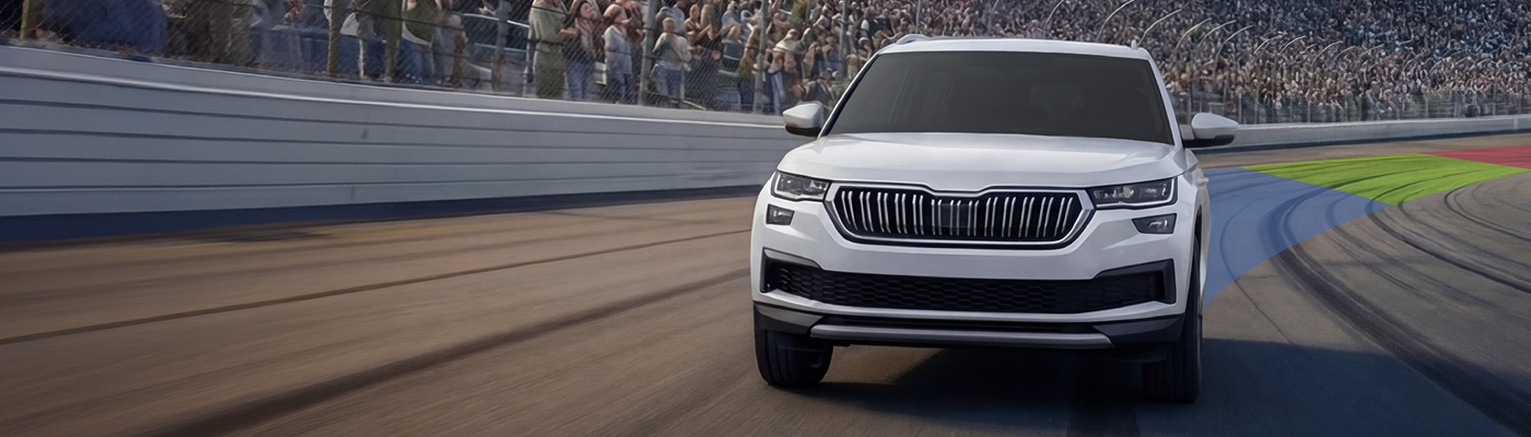 A consumer SUV banking on a NASCAR track