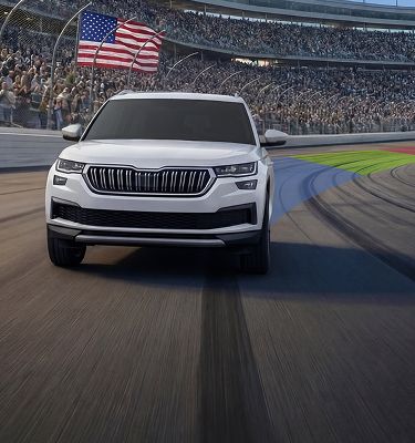 A consumer SUV banking on a NASCAR track