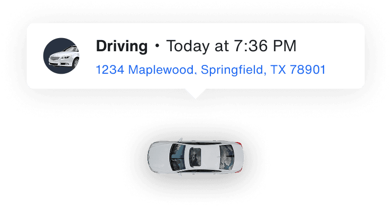 A car with a notification over it showing the current time and location