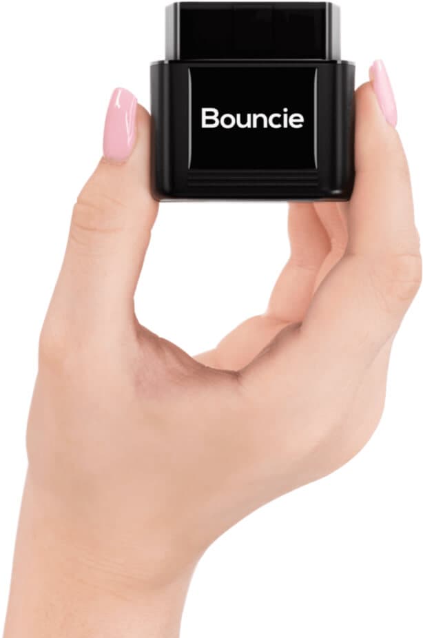 Hand holding Bouncie OBD device.